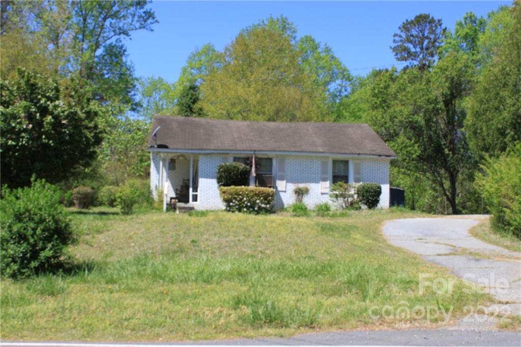 530 Edwards St Extension Rutherfordton, NC 28139 - Photo 9 of 48 a front view of a house with a yard