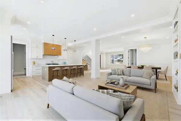 an empty room with wooden floor and ceiling fan