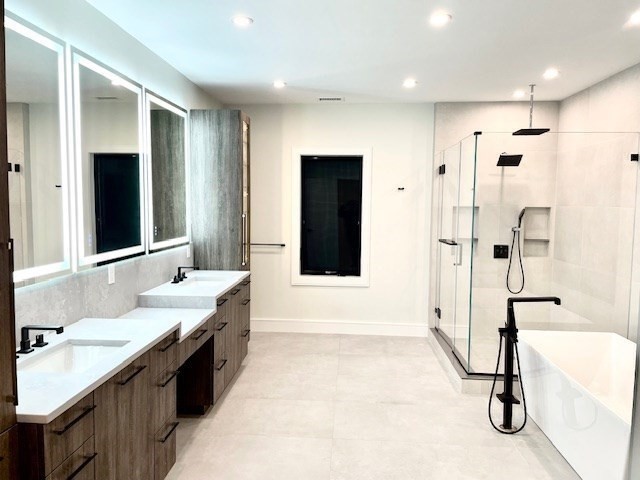 246 Forest Street Needham, MA 02492 - Photo 12 of 32 a bathroom with a double vanity sink mirror and shower