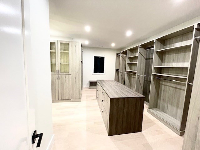 246 Forest Street Needham, MA 02492 - Photo 15 of 32 a kitchen with a refrigerator and a sink