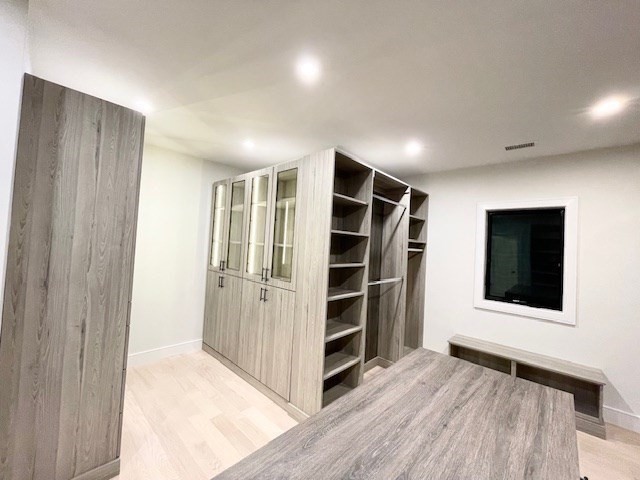 246 Forest Street Needham, MA 02492 - Photo 16 of 32 a view of wooden floor and windows in a room