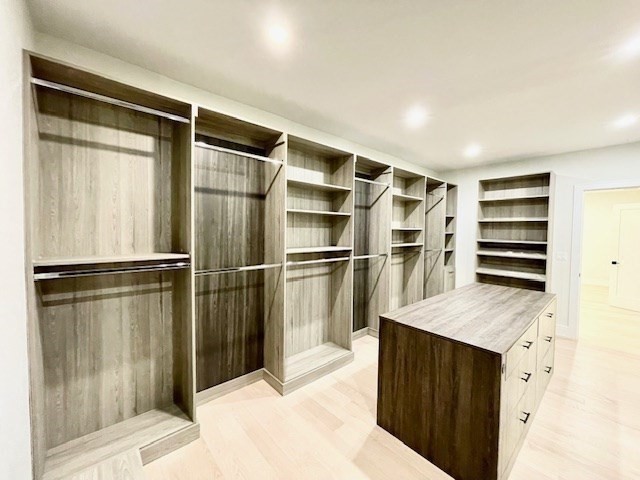 246 Forest Street Needham, MA 02492 - Photo 17 of 32 a kitchen with a refrigerator and a sink