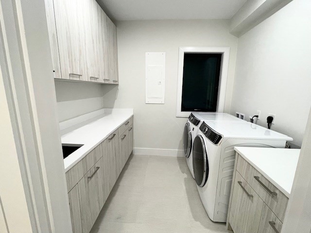 246 Forest Street Needham, MA 02492 - Photo 21 of 32 a utility room with dryer and washer