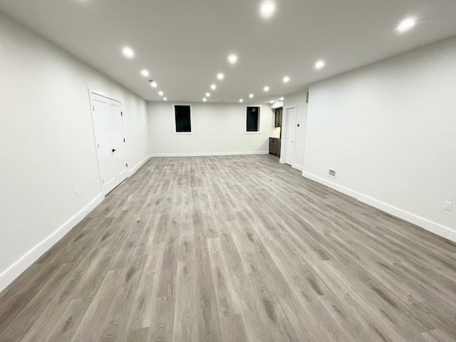 246 Forest Street Needham, MA 02492 - Photo 27 of 32 a view of empty room with wooden floor