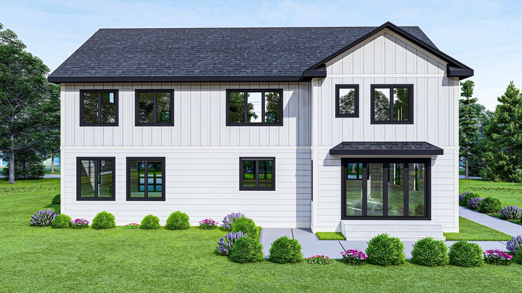 246 Forest Street Needham, MA 02492 - Photo 4 of 32 a front view of a house with a yard and plants