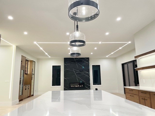 246 Forest Street Needham, MA 02492 - Photo 7 of 32 a room with stainless steel appliances kitchen island granite countertop a refrigerator and a sink