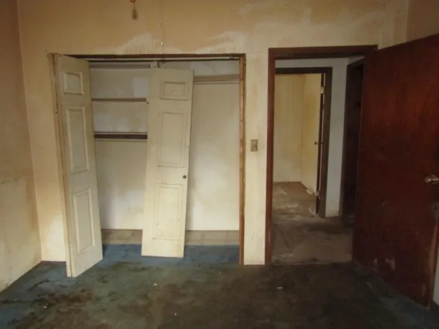 a bathroom with a bathtub and toilet
