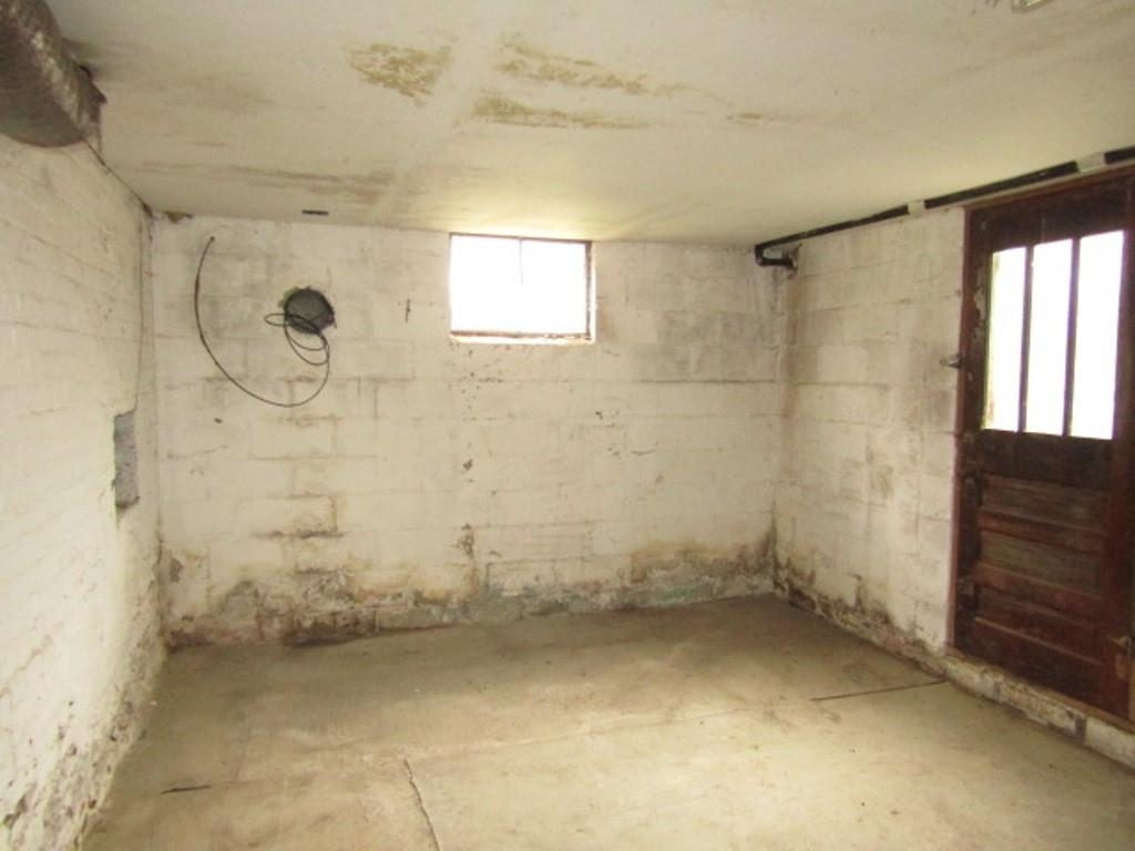 943 Mary Street Langeloth, PA 15054 - Photo 22 of 22 a bathroom with a shower