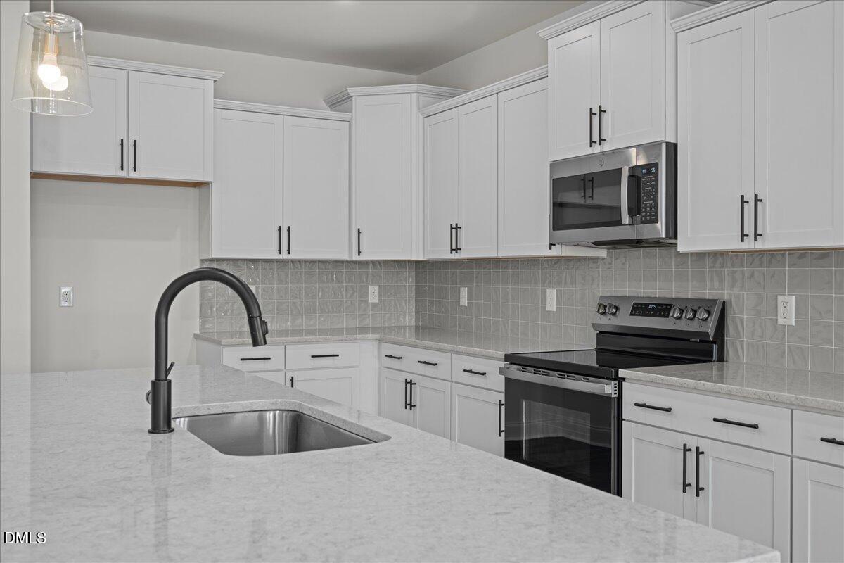 1076 Channel Drop Loop Zebulon, NC 27597 - Photo 11 of 67 19-DSC07263