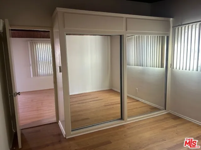 a view of a bedroom from the hallway