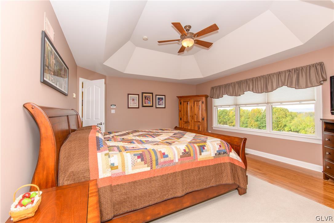 577 Lefevre Road Easton, PA 18040 - Photo 18 of 30 a bed sitting in a bedroom next to a window