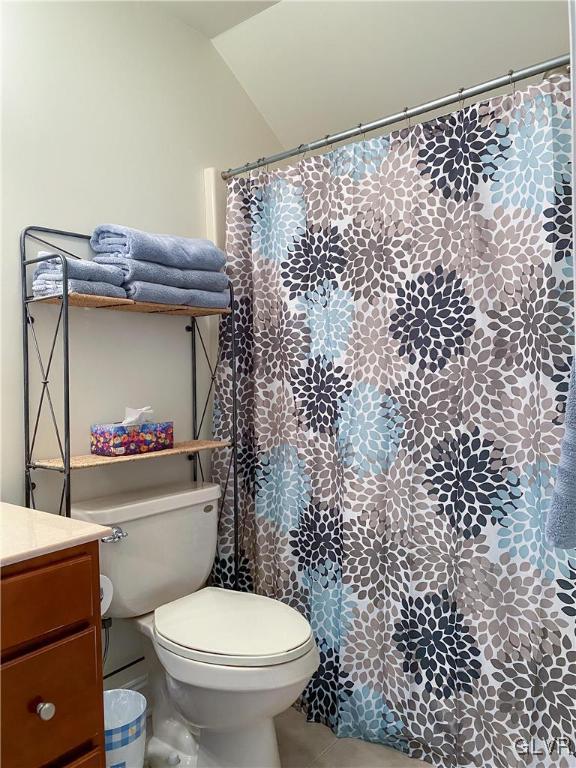 577 Lefevre Road Easton, PA 18040 - Photo 23 of 30 a bathroom with a toilet and a shower curtain
