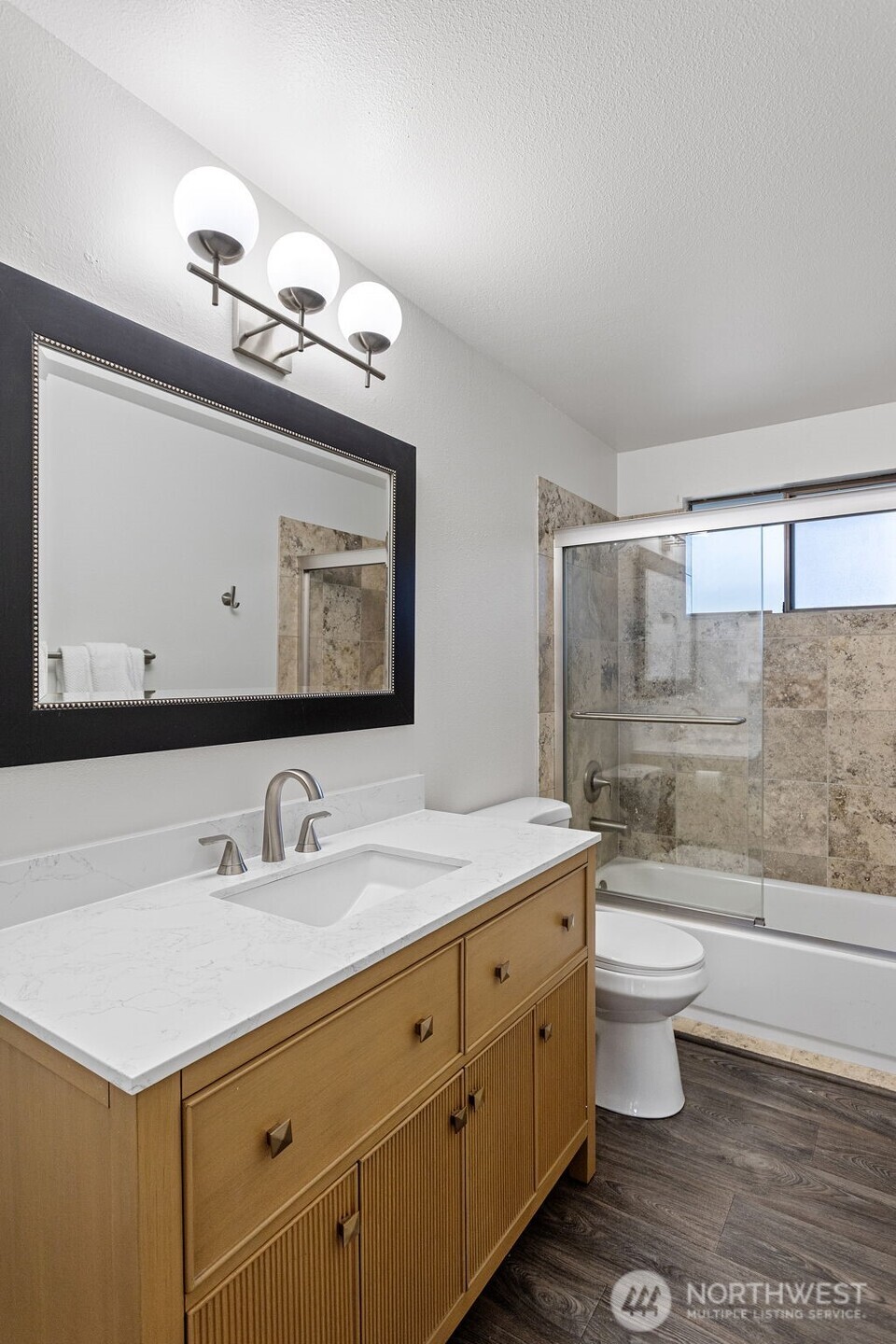 32321 44th Place Southwest Federal Way, WA 98023 - Photo 14 of 37 a bathroom with a sink a toilet and a mirror