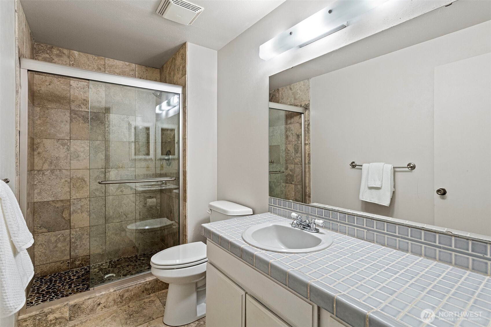 32321 44th Place Southwest Federal Way, WA 98023 - Photo 17 of 37 a bathroom with a sink a toilet and shower