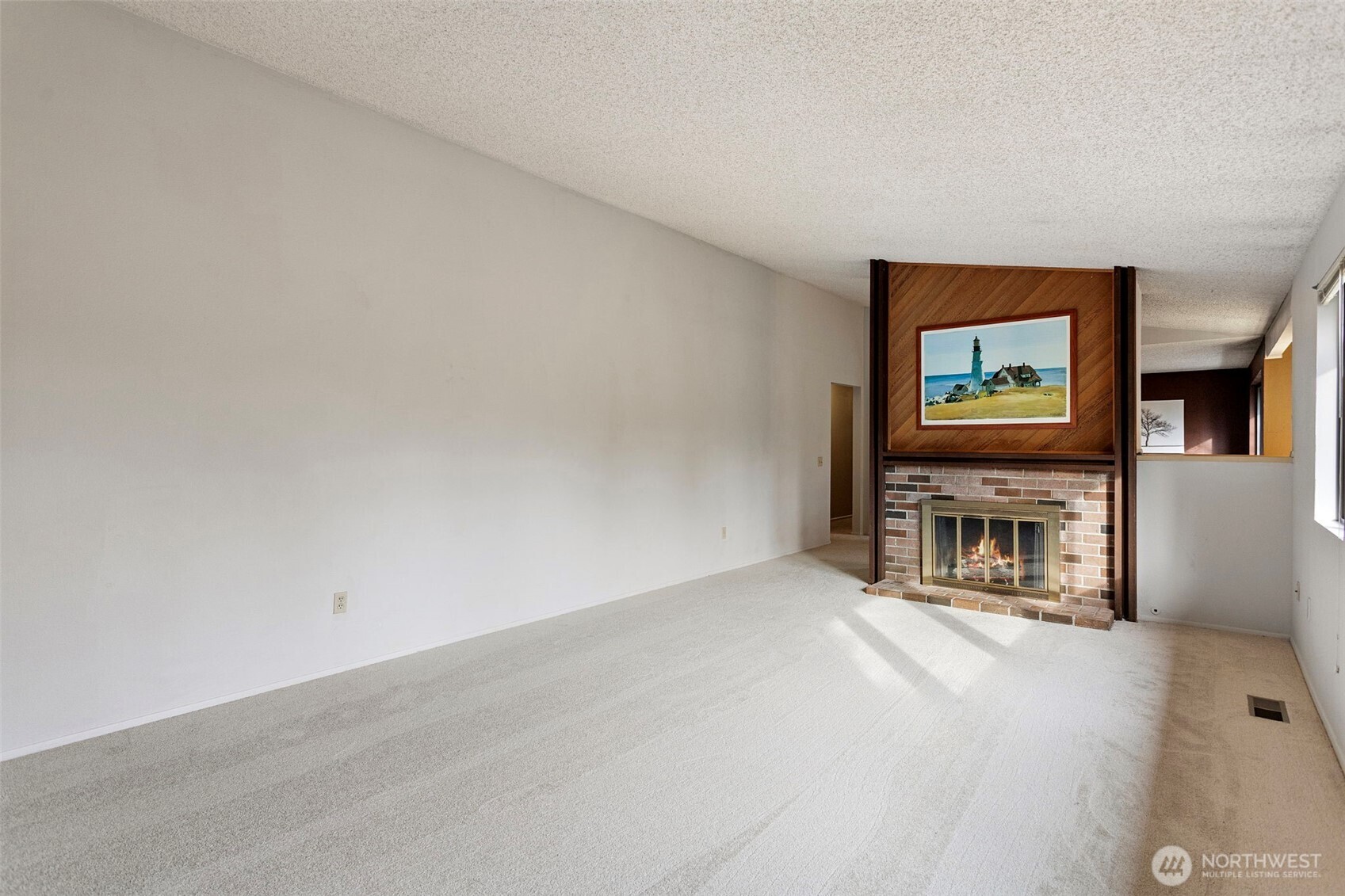 32321 44th Place Southwest Federal Way, WA 98023 - Photo 5 of 37 an empty room with fireplace and projector