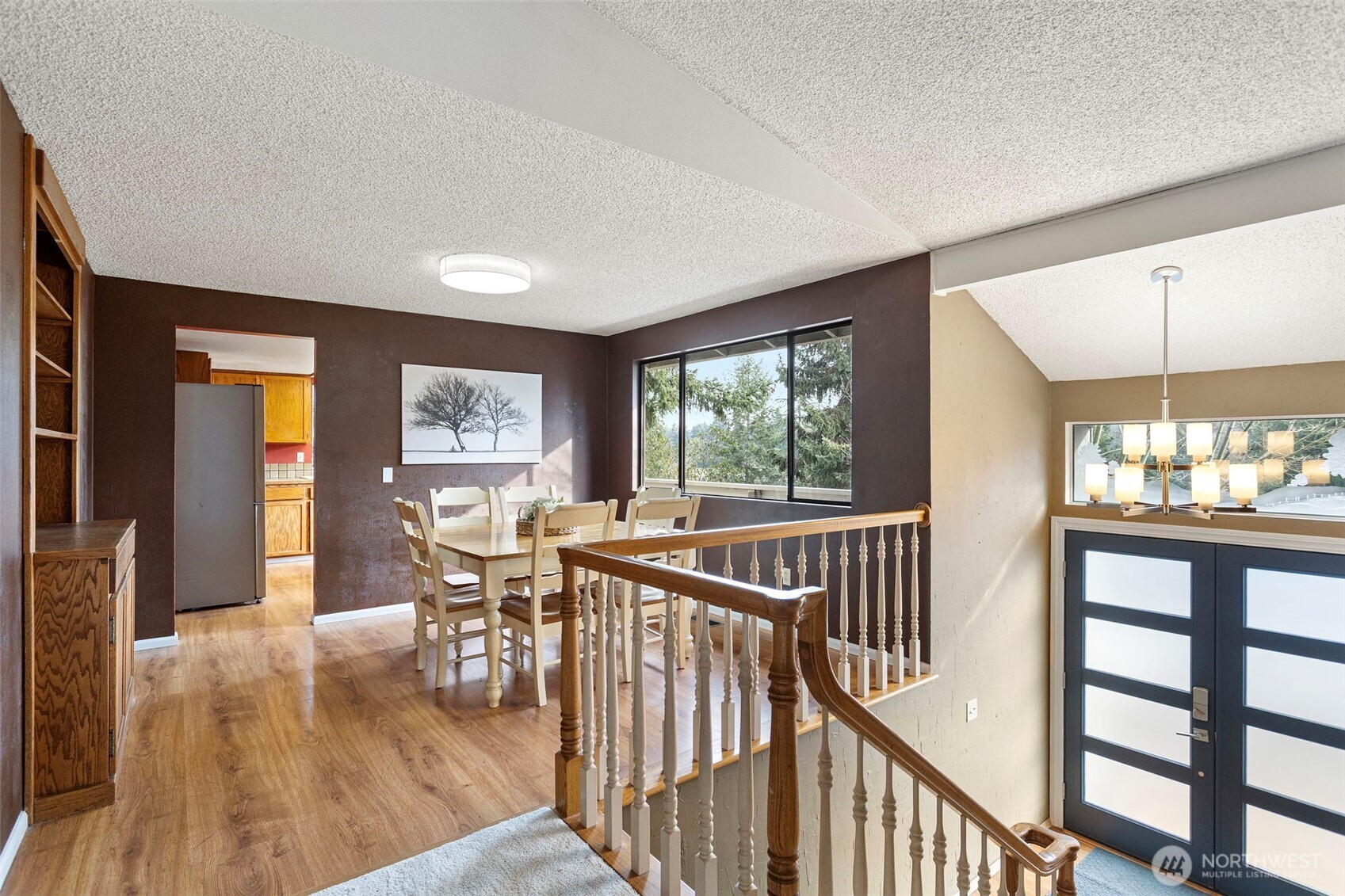 32321 44th Place Southwest Federal Way, WA 98023 - Photo 7 of 37 a view of a dining room with furniture window and wooden floor