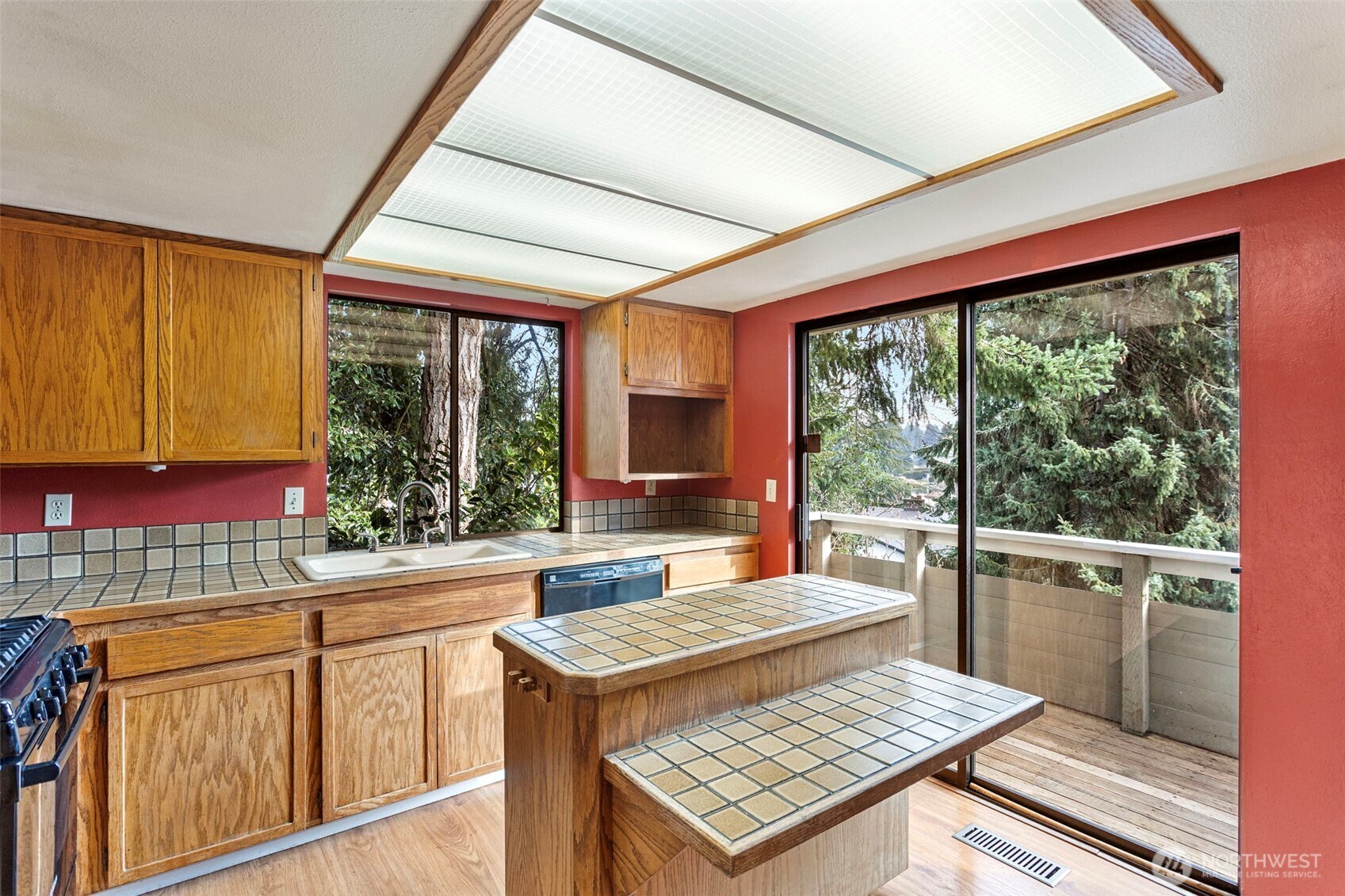 32321 44th Place Southwest Federal Way, WA 98023 - Photo 10 of 37 a view of a kitchen with a sink and a large window