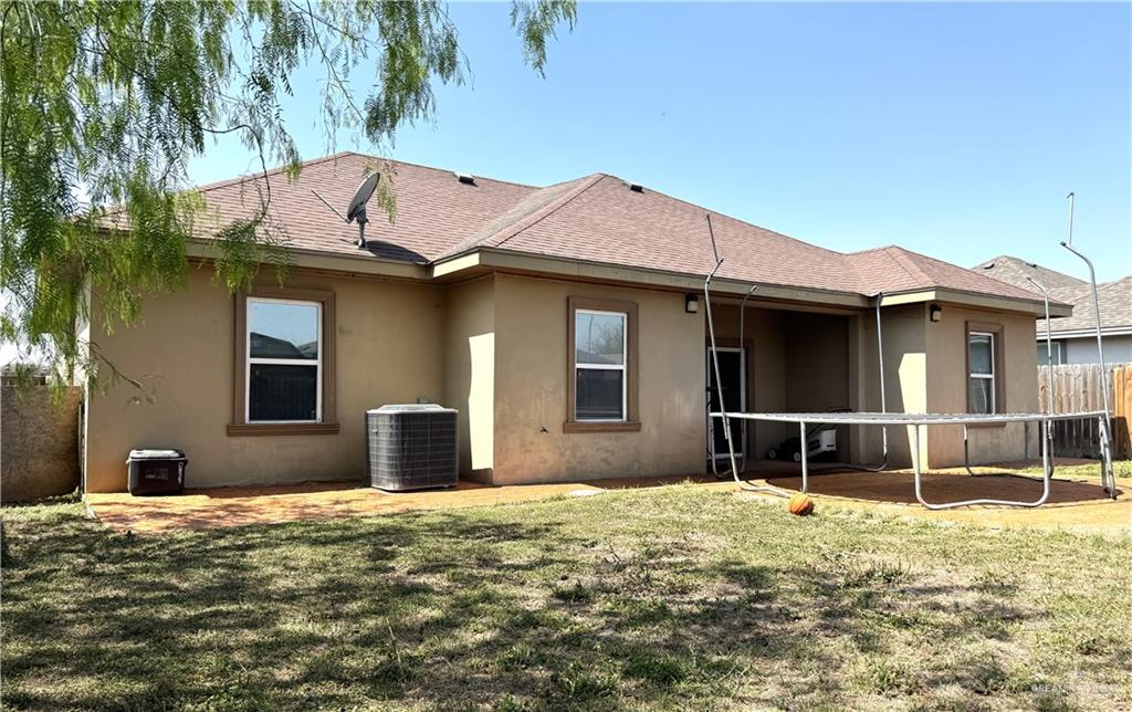 6105 South Mars Lane Pharr, TX 78577 - Photo 12 of 45 a house view with a outdoor space
