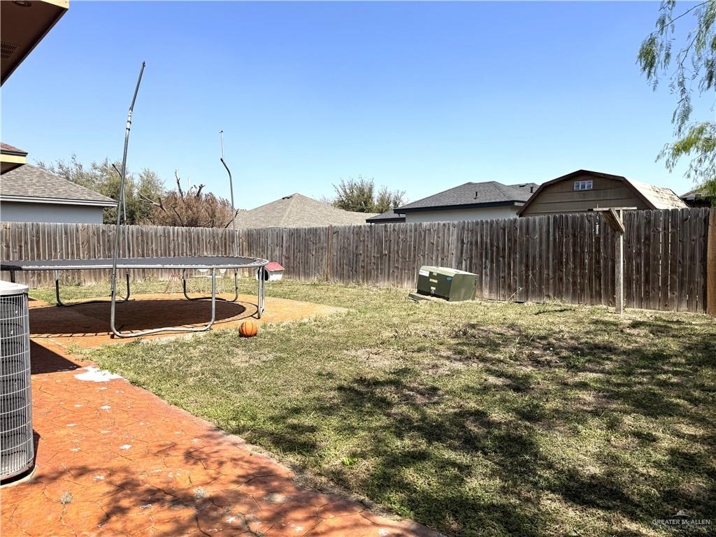 6105 South Mars Lane Pharr, TX 78577 - Photo 14 of 45 a backyard of a house