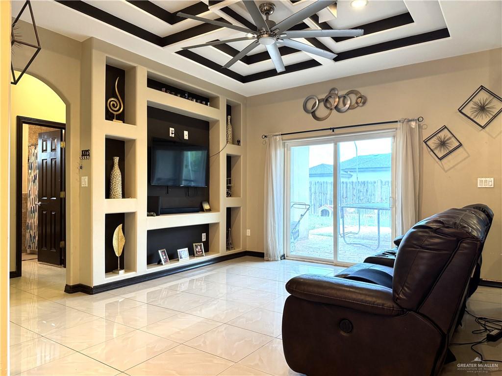 6105 South Mars Lane Pharr, TX 78577 - Photo 21 of 45 a living room with furniture and a window