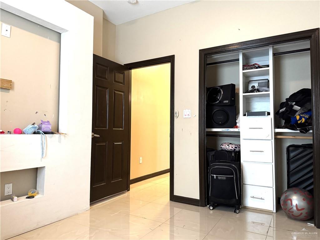 6105 South Mars Lane Pharr, TX 78577 - Photo 41 of 45 a view of kitchen and utility room