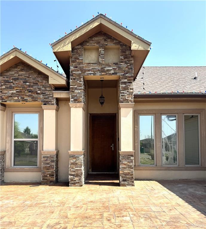 6105 South Mars Lane Pharr, TX 78577 - Photo 5 of 45 a front view of a house