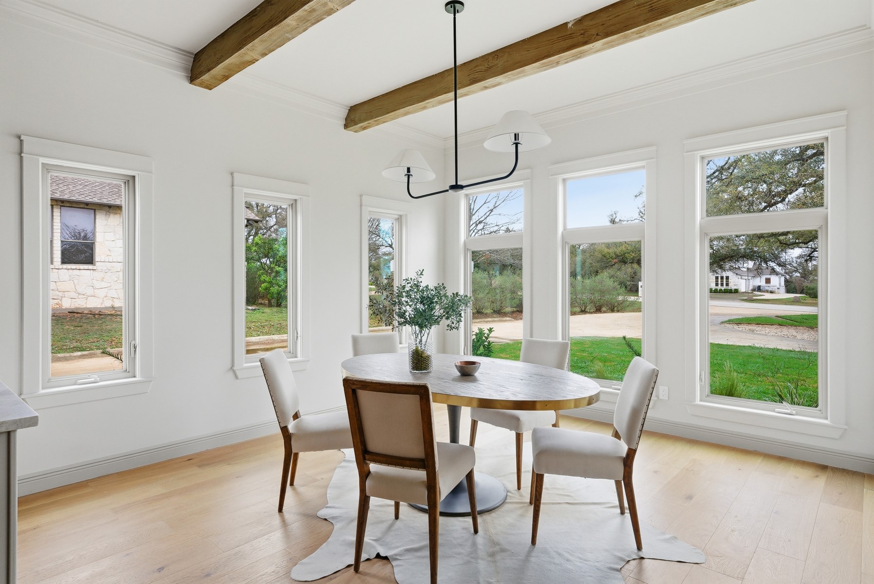 10259 Brangus Road Driftwood, TX 78619 - Photo 13 of 39 a view of a dining room with furniture window and outside view