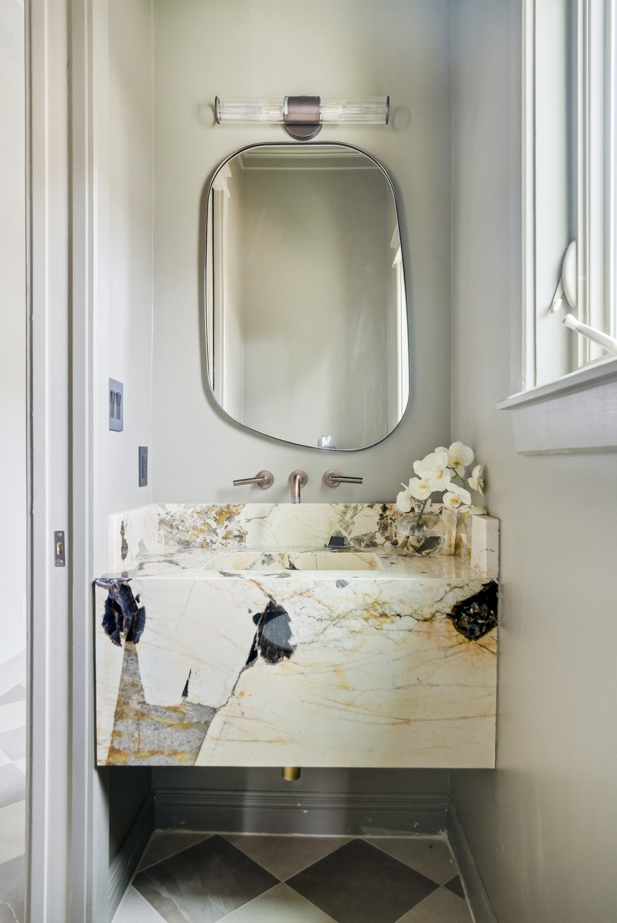 10259 Brangus Road Driftwood, TX 78619 - Photo 14 of 39 a bathroom with a sink and mirror