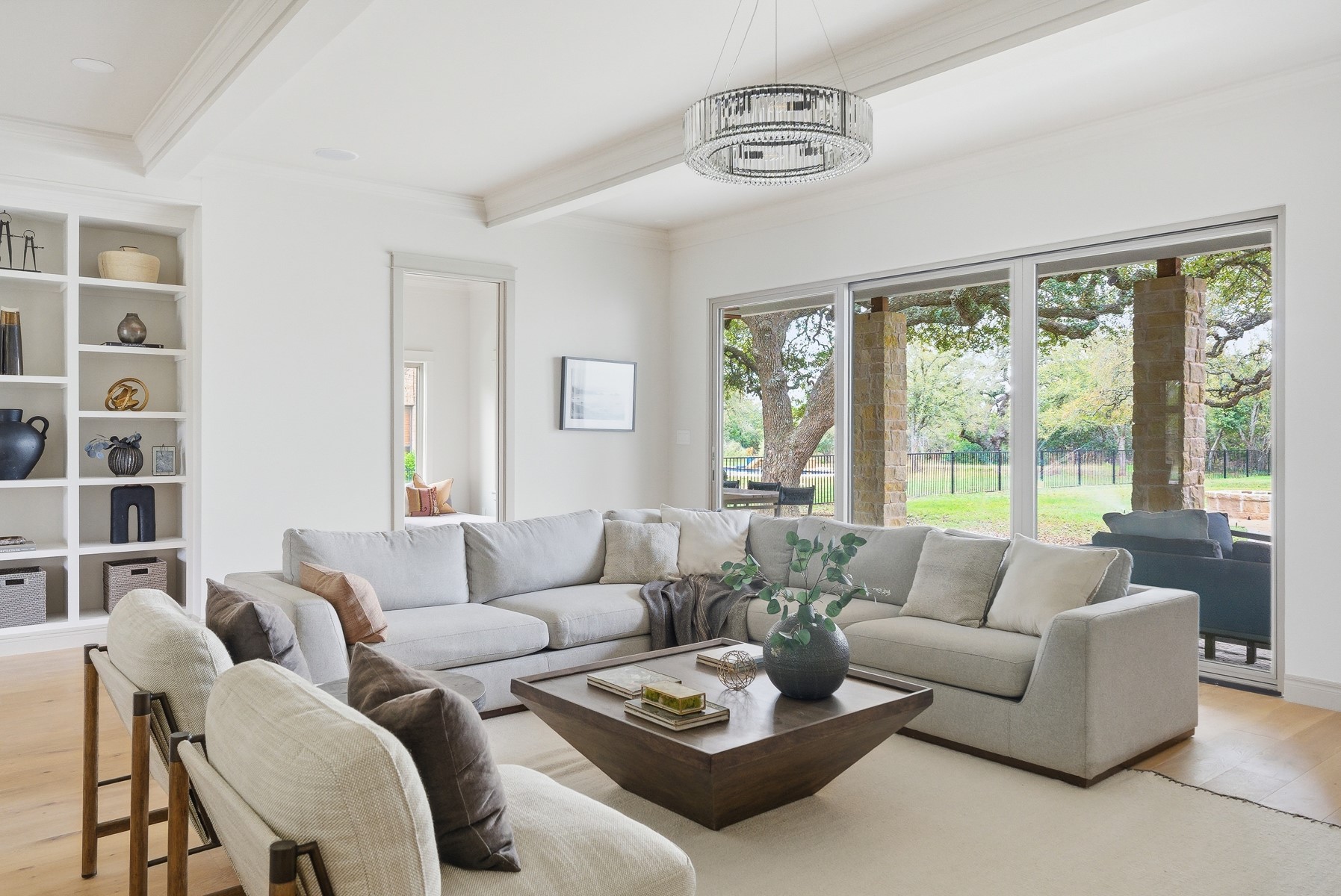 10259 Brangus Road Driftwood, TX 78619 - Photo 16 of 39 a living room with furniture and a large window