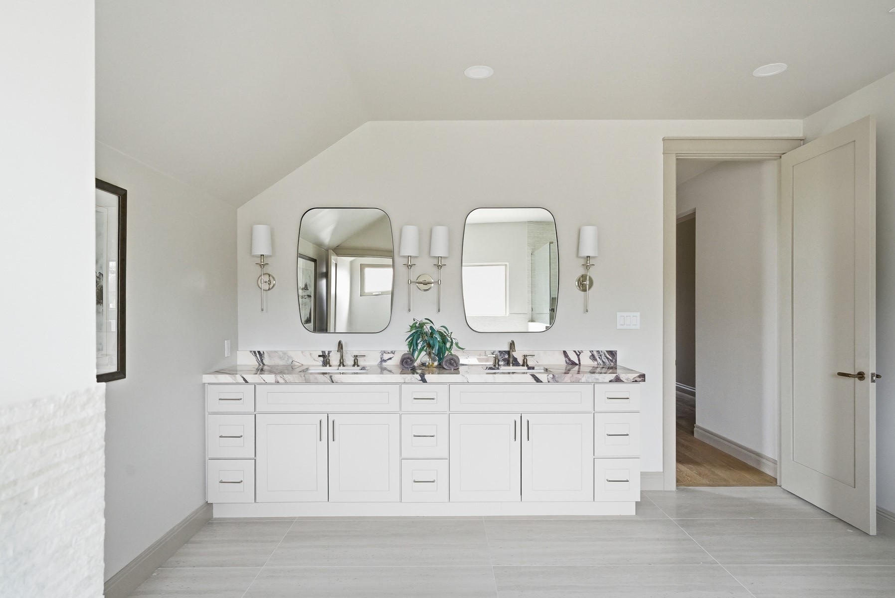 10259 Brangus Road Driftwood, TX 78619 - Photo 28 of 39 a bathroom with a double vanity sink and a mirror