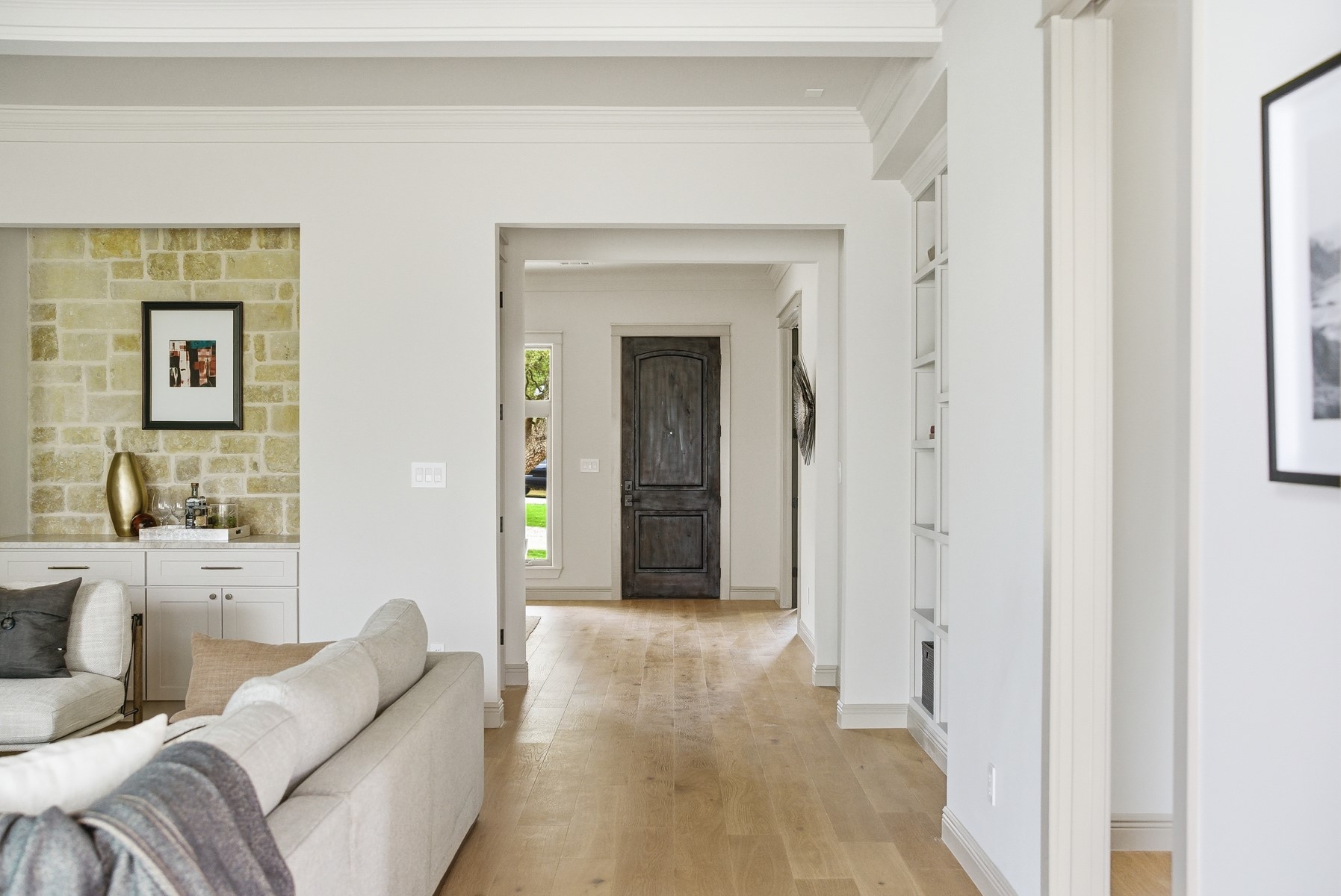 10259 Brangus Road Driftwood, TX 78619 - Photo 4 of 39 a living room with furniture and a fireplace