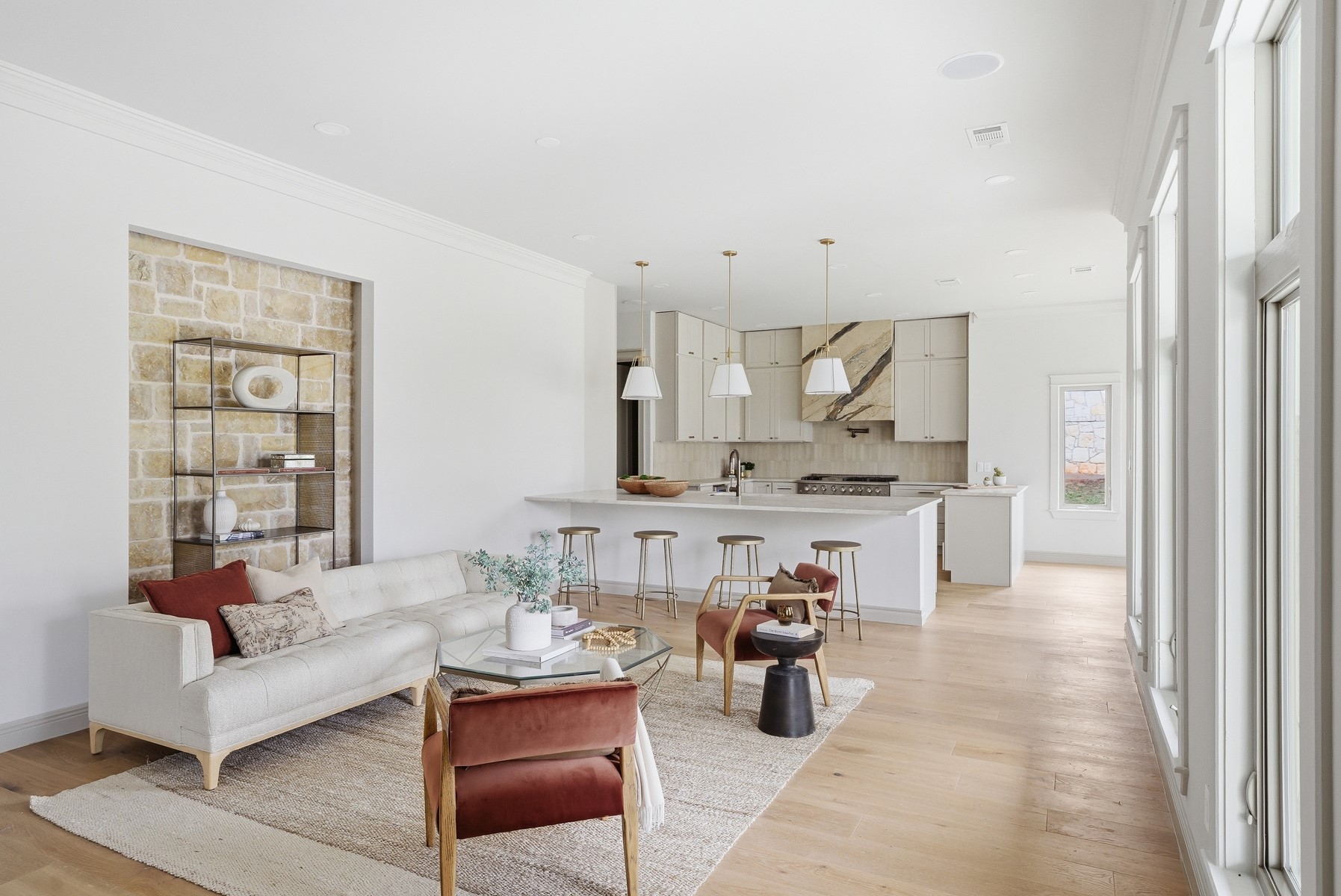 10259 Brangus Road Driftwood, TX 78619 - Photo 7 of 39 a living room with furniture and a wooden floor