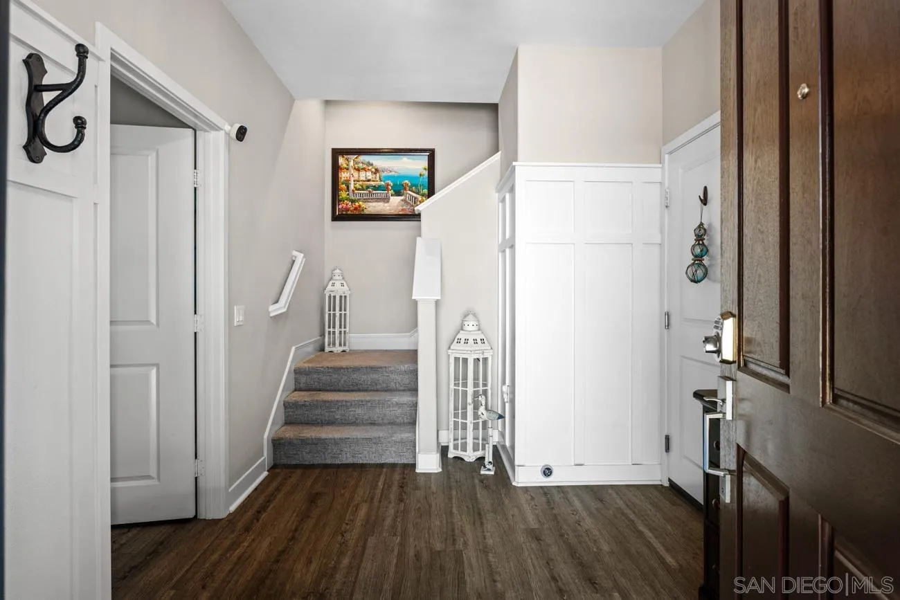 4326 Star Path Way, Unit 1 Oceanside, CA 92056 - Photo 5 of 46 a view of entryway with wooden floor and stairs