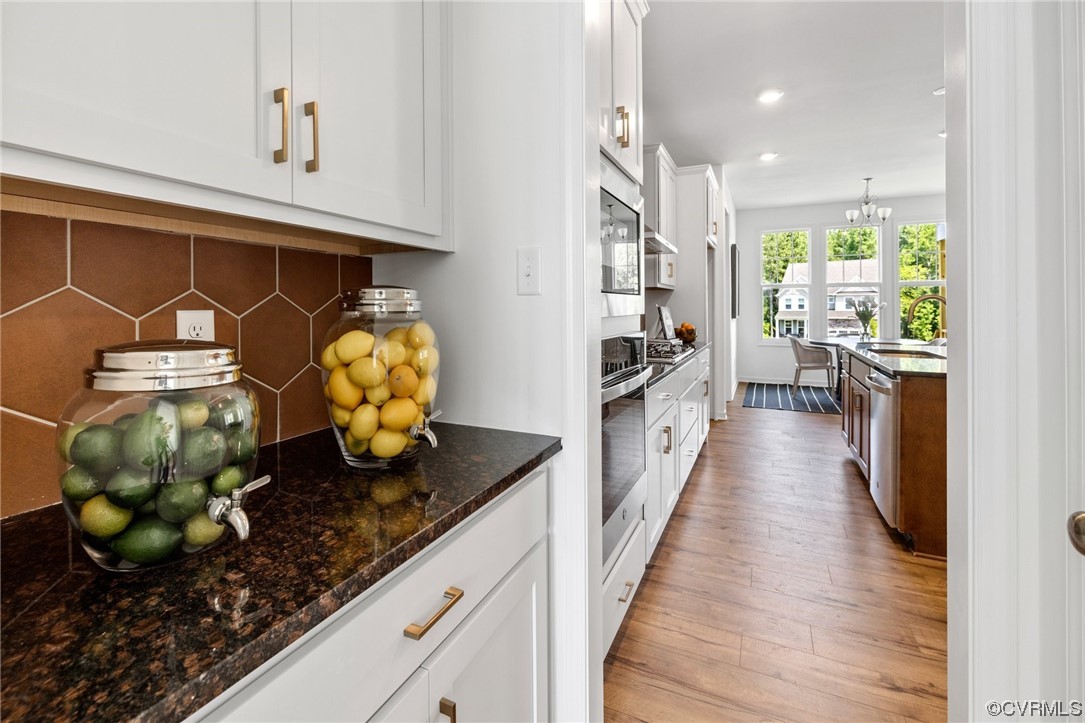 9118 Copplestone Road Chesterfield, VA 23832 - Photo 15 of 48 a kitchen with stainless steel appliances granite countertop a lot of counter space