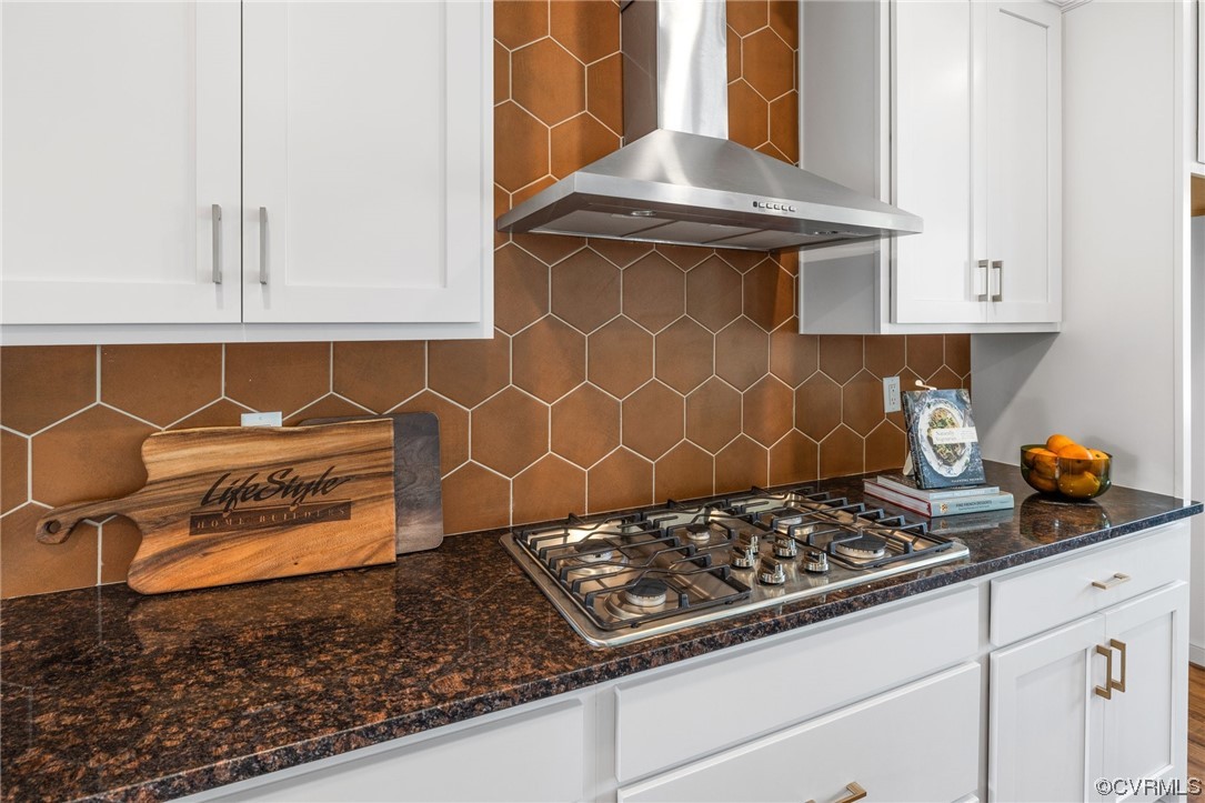 9118 Copplestone Road Chesterfield, VA 23832 - Photo 17 of 48 a kitchen with a stove and cabinets