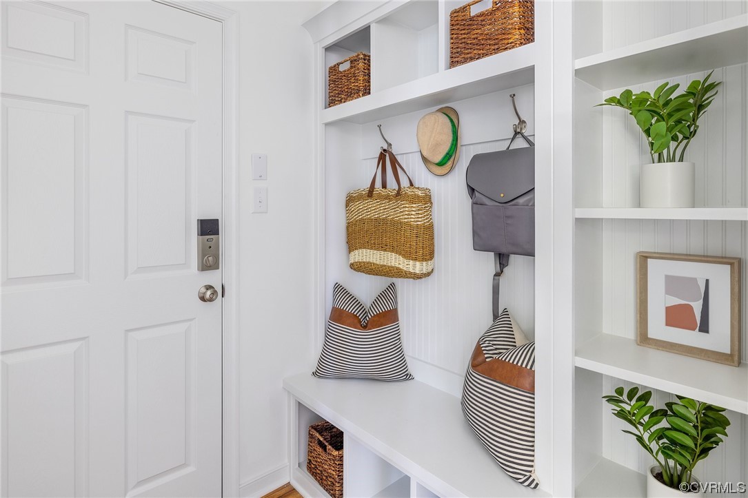 9118 Copplestone Road Chesterfield, VA 23832 - Photo 24 of 48 a living room with furniture and a potted plant