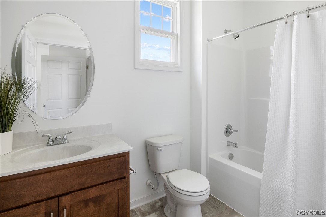 9118 Copplestone Road Chesterfield, VA 23832 - Photo 29 of 48 a bathroom with a sink toilet and shower