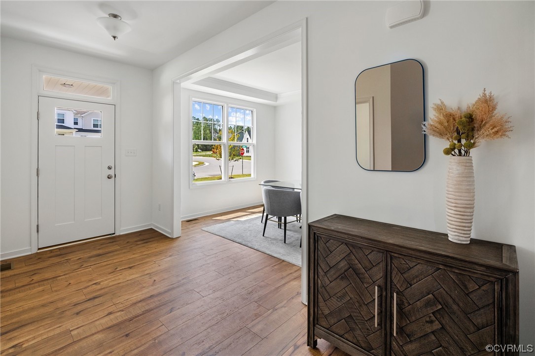 9118 Copplestone Road Chesterfield, VA 23832 - Photo 3 of 48 a living room with furniture and a window