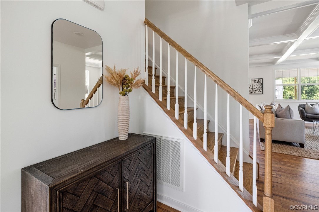 9118 Copplestone Road Chesterfield, VA 23832 - Photo 4 of 48 a view of staircase with railing and a rug