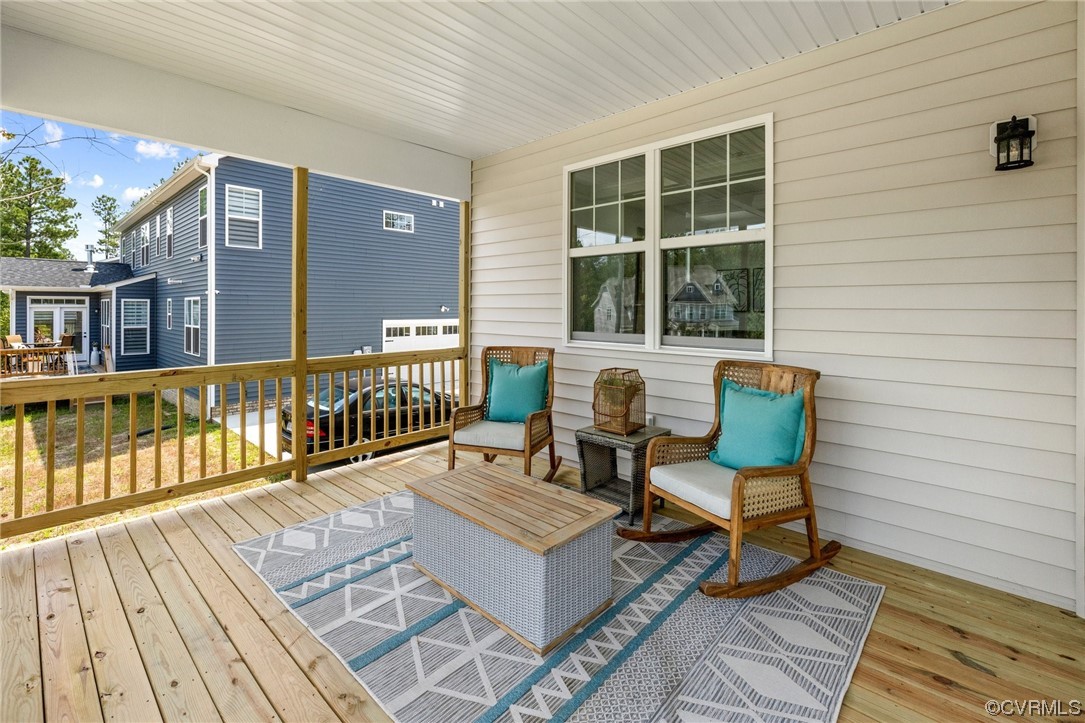 9118 Copplestone Road Chesterfield, VA 23832 - Photo 48 of 48 a balcony with wooden floor and outdoor seating