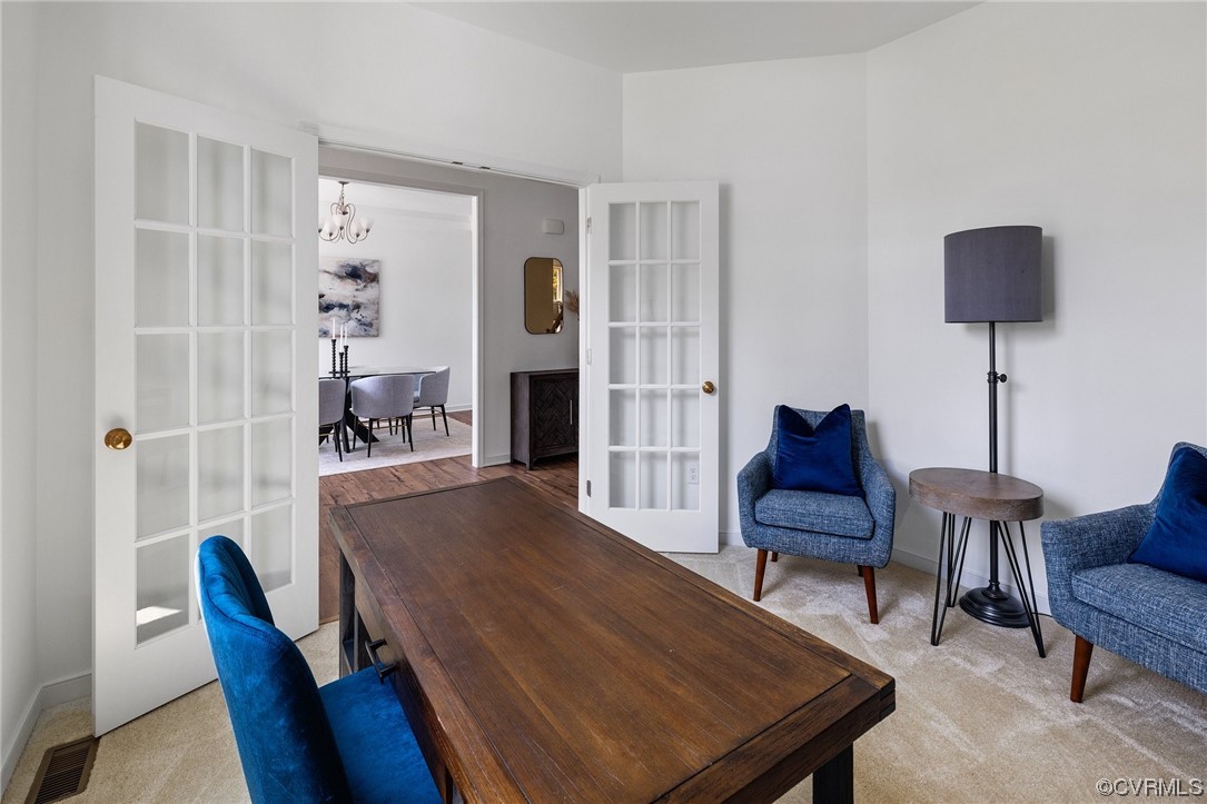 9118 Copplestone Road Chesterfield, VA 23832 - Photo 9 of 48 a living room with furniture a rug and a table