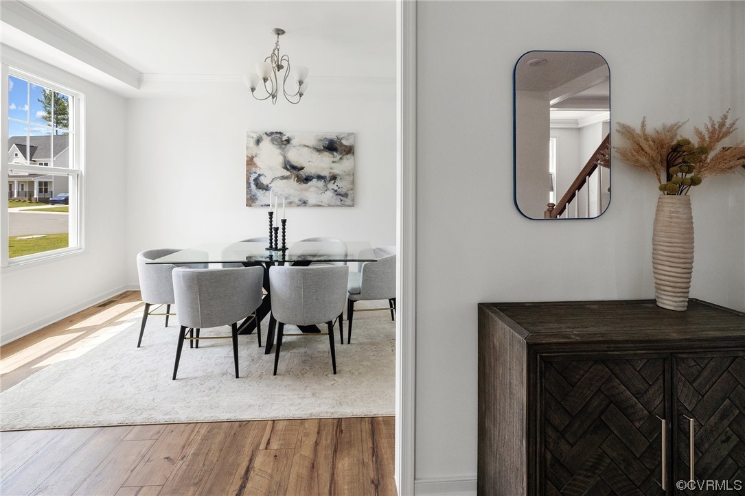 9118 Copplestone Road Chesterfield, VA 23832 - Photo 10 of 48 a living room with furniture a window and a table