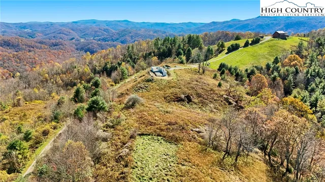 a view of a backyard with green space