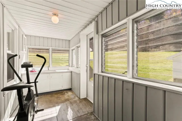 a view of a room with windows