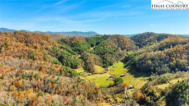 a view of a large body of water and mountain
