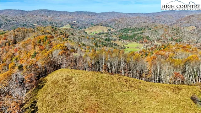 a view of large mountain with an outdoor space