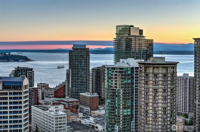 a view of a city with tall buildings