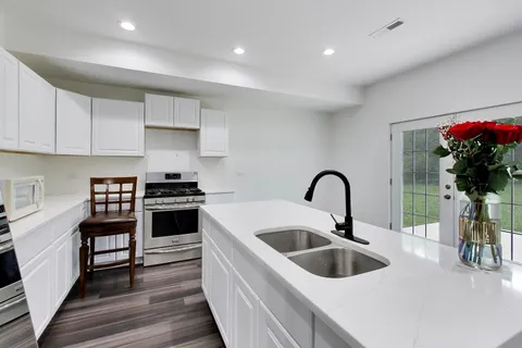 $335,000 | 13723 South Springfield Avenue, Unit 1, Robbins, IL 60472