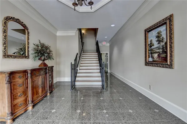 a view of a hallway with staircase