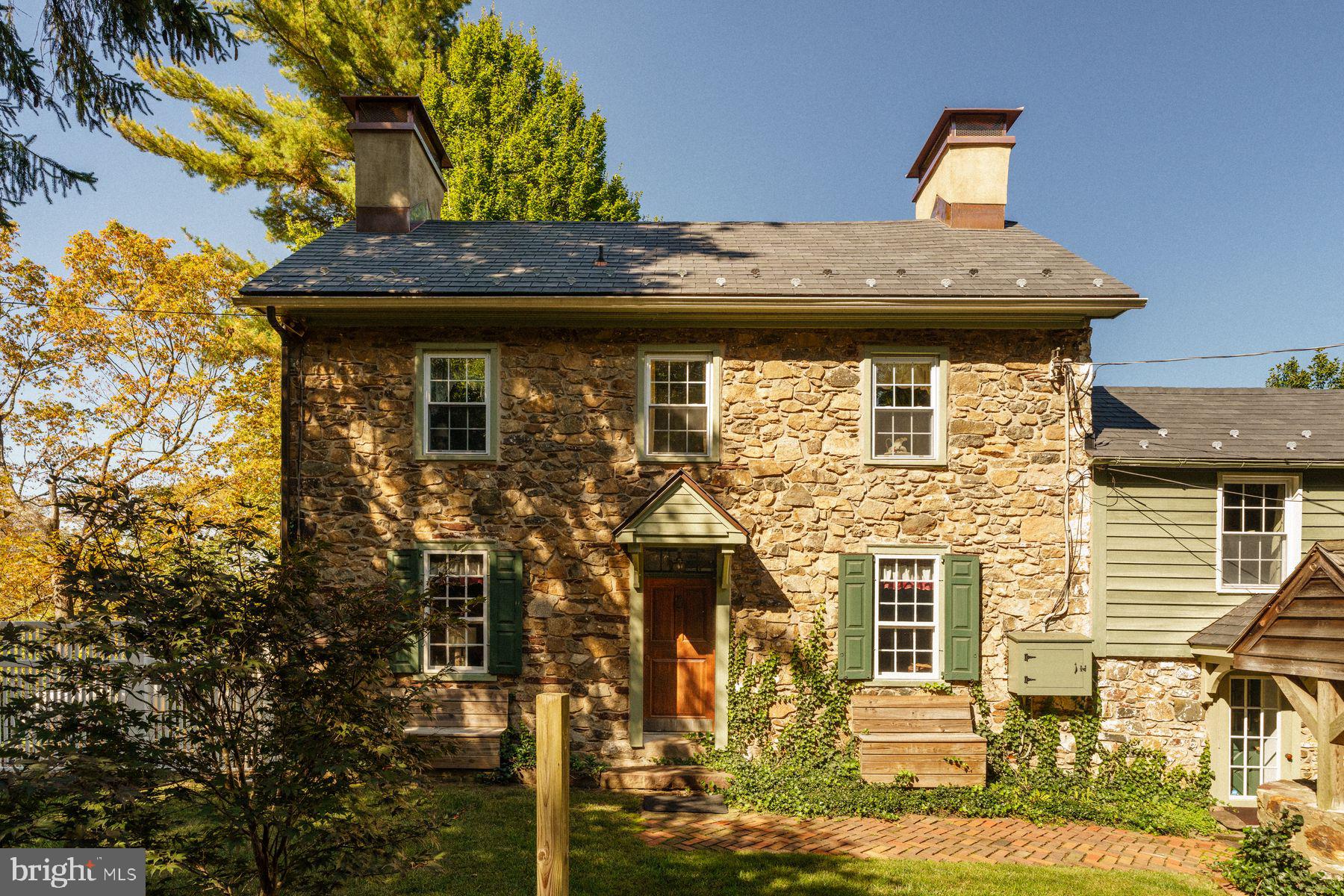 a front view of a building with barbeque area